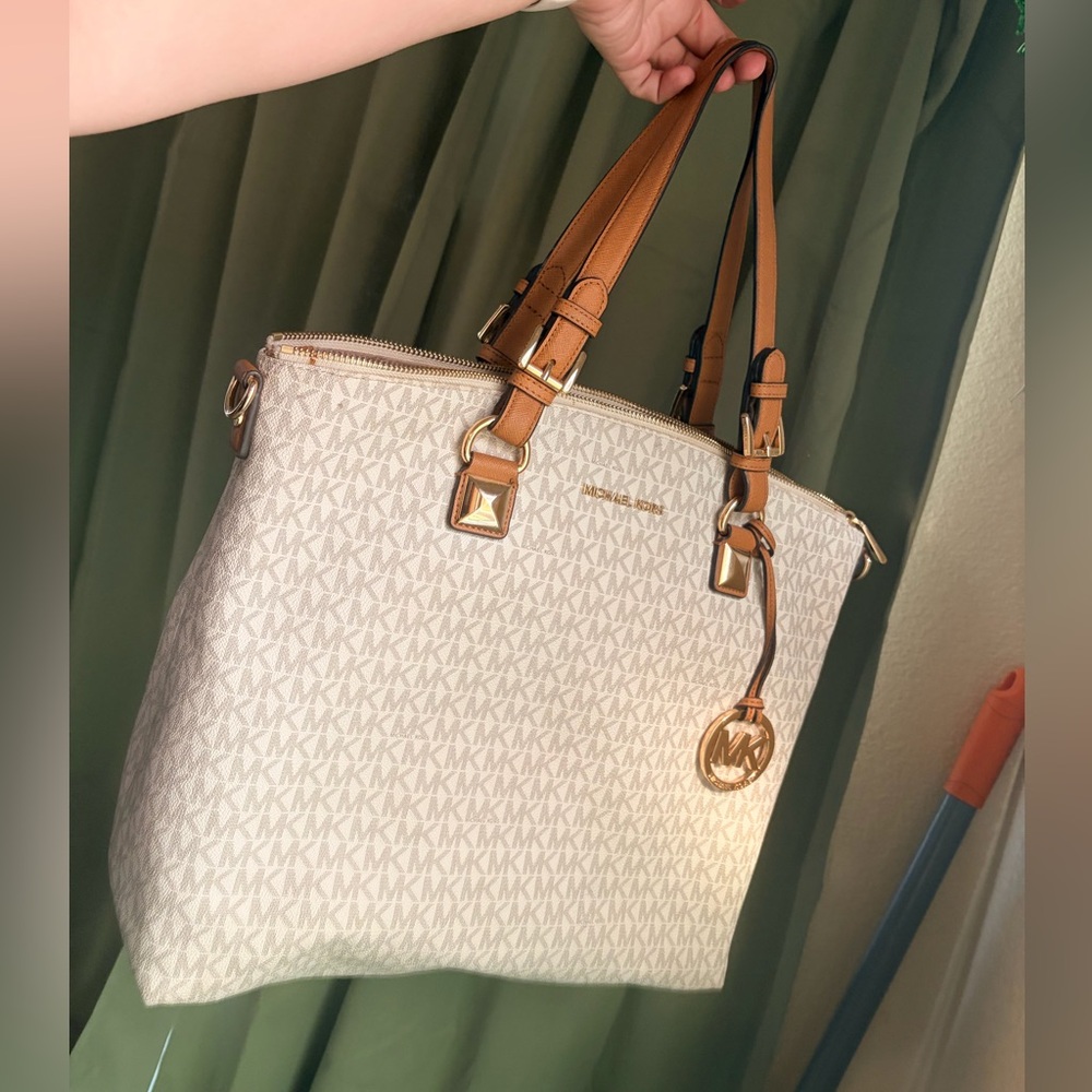 Michael Kors Signature Tan and Cream Tote with electrics sleeve inside